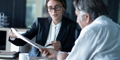 customer talking to specialist to learn about insolvency and debt relief.