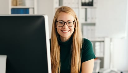 Woman wearing glasses smiling